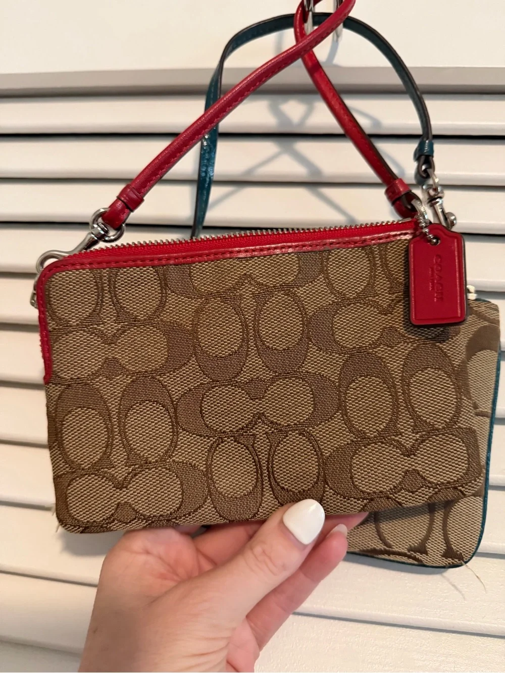 Coach two wristlets